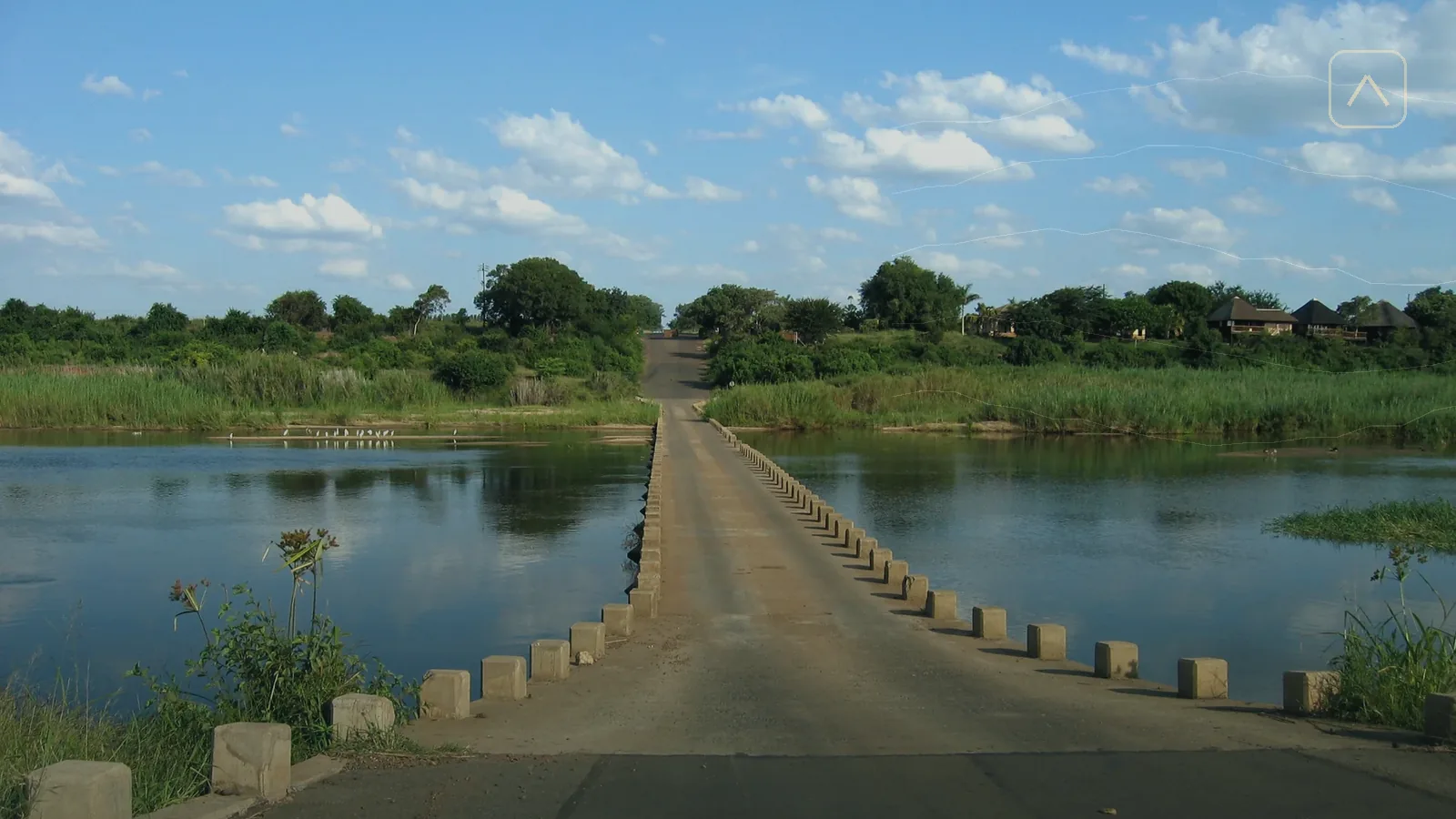 Vehicle approaching a Kruger National Park entrance gate for a day visit