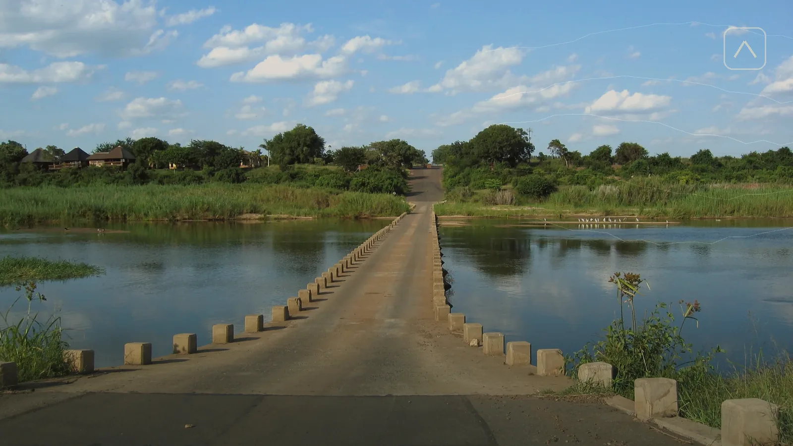 Road and entrance signage at a southern Kruger gate near Malelane